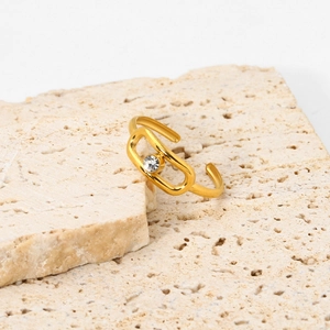 Detailed close-up of 18K gold plated ring with marquise cutout and sparkling cubic zirconia