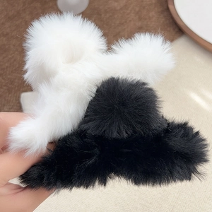 Furry plush oversized shark hair claw clips in black and white for thick hair