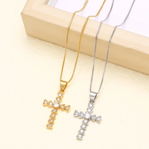 Cross pendant necklaces with large cubic zirconia in gold and silver finish