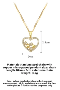 Close-up of gold heart pendant necklace featuring micro-pave zirconia and tiny stacked hearts