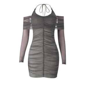 Detail of dark grey glitter fabric with pleated texture on the bodycon evening dress