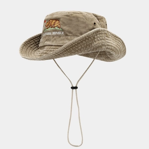 Detail of embroidered bear logo and California Republic text on khaki bucket hat
