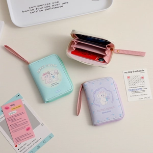 Detailed view of accordion card slots and pastel PU leather finish of the coin purse
