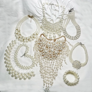 Multilayer faux pearl necklace and bracelet set with silver and gold metal clasps