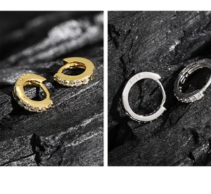 Macro view of S925 sterling silver hoop earrings with micro-paved cubic zirconia stones