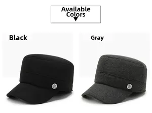 Detail view of winter flat top caps in grey and black wool with metal star accents