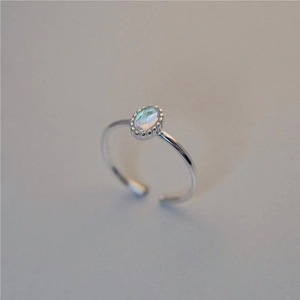 Minimalist 925 sterling silver open ring featuring an oval iridescent crystal stone