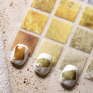 Retro geometric nail art stickers with vintage earth tones and decorative pearls