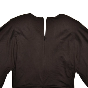 Close-up of the back zipper closure and batwing sleeve detail on the dark brown dress