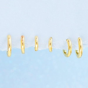 Polished 18K gold plated hoop earrings set in 6 different sizes for multi-piercing