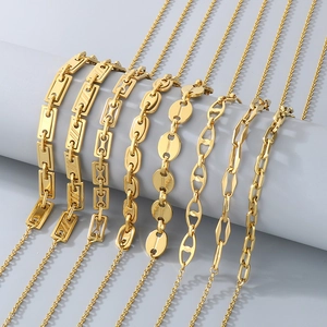 Detail of seven gold stainless steel bracelets with geometric coffee bean and pig nose links