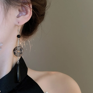 Detail of New Chinese style earrings with ink calligraphy and black teardrop pendants