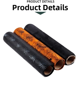 Detail of Halloween mesh tulle rolls with spider web and skull patterns for table decor