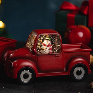 Vintage red Christmas truck snow globe with snowman and warm LED lights decoration