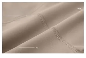 Macro view of tight flat-lock stitching on high-elastic seamless sportswear fabric