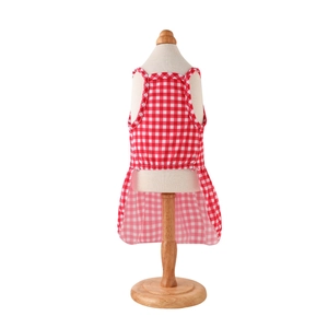 Detailed view of the red and white gingham pet dress with elastic waist and ruffles