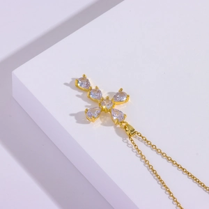 Luxurious gold stainless steel cross necklace with shiny teardrop zircon stones for women