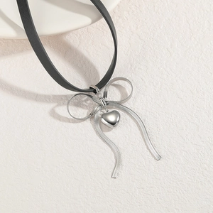 18K gold plated stainless steel choker with black cord bow and heart pendant