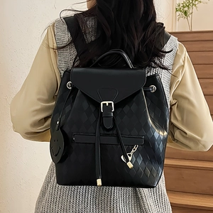 Fashionable black quilted leather backpack for women with drawstring and flap closure