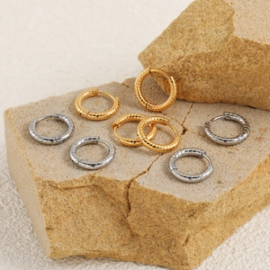 Minimalist twisted rope texture hoop earrings in polished gold and silver steel finish