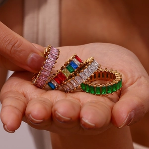 Detail of 18K gold-plated eternity rings set with colorful rectangular zircons