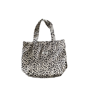 Retro leopard print canvas tote bag with Korean slogan on a clean white background