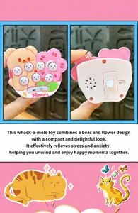 Close-up detail of a pink bear whack-a-mole handheld mini game machine keychain accessory