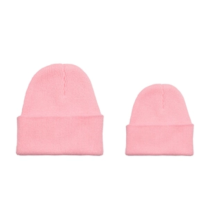 Pink rib-knit parent-child hat set featuring two matching beanies with folded cuffs