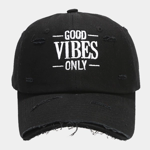 Detail of Good Vibes Only white embroidery on black distressed cotton baseball cap