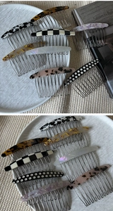 Various acetate hair side combs with patterns including tortoiseshell and marble texture