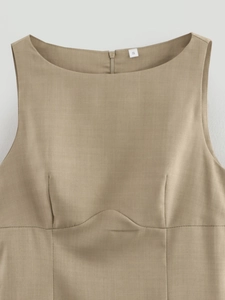 Detail of khaki sleeveless dress featuring round neck, back zipper and size S label