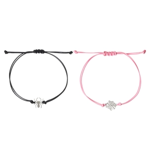 Handmade woven cord bracelets with metal spider and spiderweb charms for couples