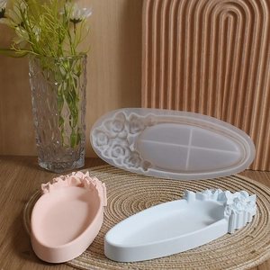 Floral oval silicone mold with finished rose relief resin trays for DIY crafts