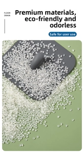 Eco-friendly silicone floor drain cover with handle shown over raw material pellets