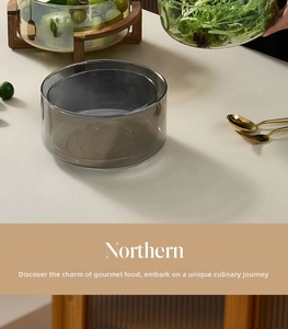 Grey transparent glass salad bowl with minimalist cylindrical design for kitchen dining