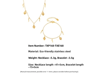 Detail of 18K gold plated stainless steel necklace and bracelet with heart pendants