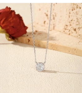 Close-up of S925 silver necklace featuring a round rose-cut diamond-like pendant