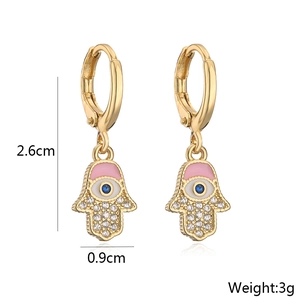 Detailed view of Hamsa earrings with size 2.6cm and weight 3g in gold finish