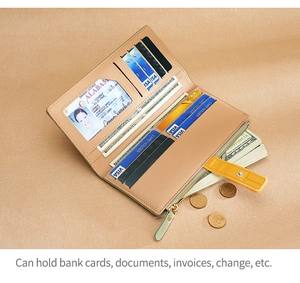Detail of multi-functional long wallet interior showing card slots and zipper pocket
