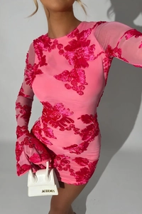 Close-up of pink mesh dress with 3D floral embroidery and bell sleeve details