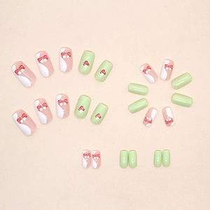 Avocado green square press-on nails featuring cute red mushroom and bow-knot designs