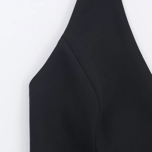Elegant black halter neck vest featuring double-breasted detail and a sleeveless slim fit
