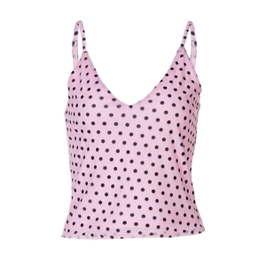 Detailed view of pink polka dot camisole with thin adjustable spaghetti straps