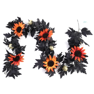 Artificial Halloween garland with black maple leaves, orange sunflowers and golden pumpkins