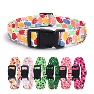 Holiday pet collar with bow tie, festive egg clover heart prints, and safety buckle