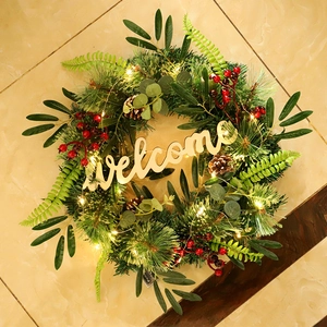 Christmas olive branch and pine needle wreath with LED lights and Welcome wooden sign