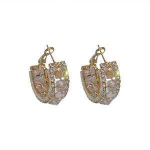 Sparkling silver C-shaped hoop earrings with micro-paved cubic zirconia stones