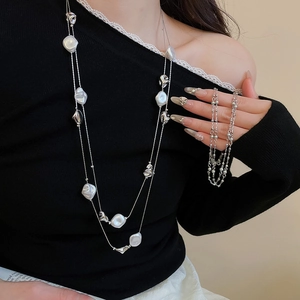 Elegant double-layered silver necklace with baroque pearls and irregular silver beads