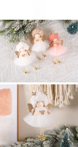 Detail view of plush Christmas angel ornaments with gauze skirts and glitter wings
