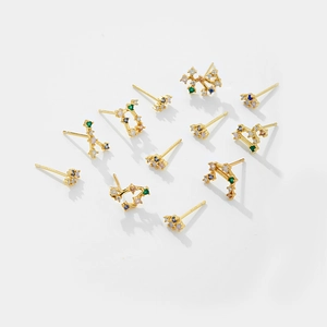 Detailed macro view of S925 sterling silver zodiac earrings with colorful cubic zirconia